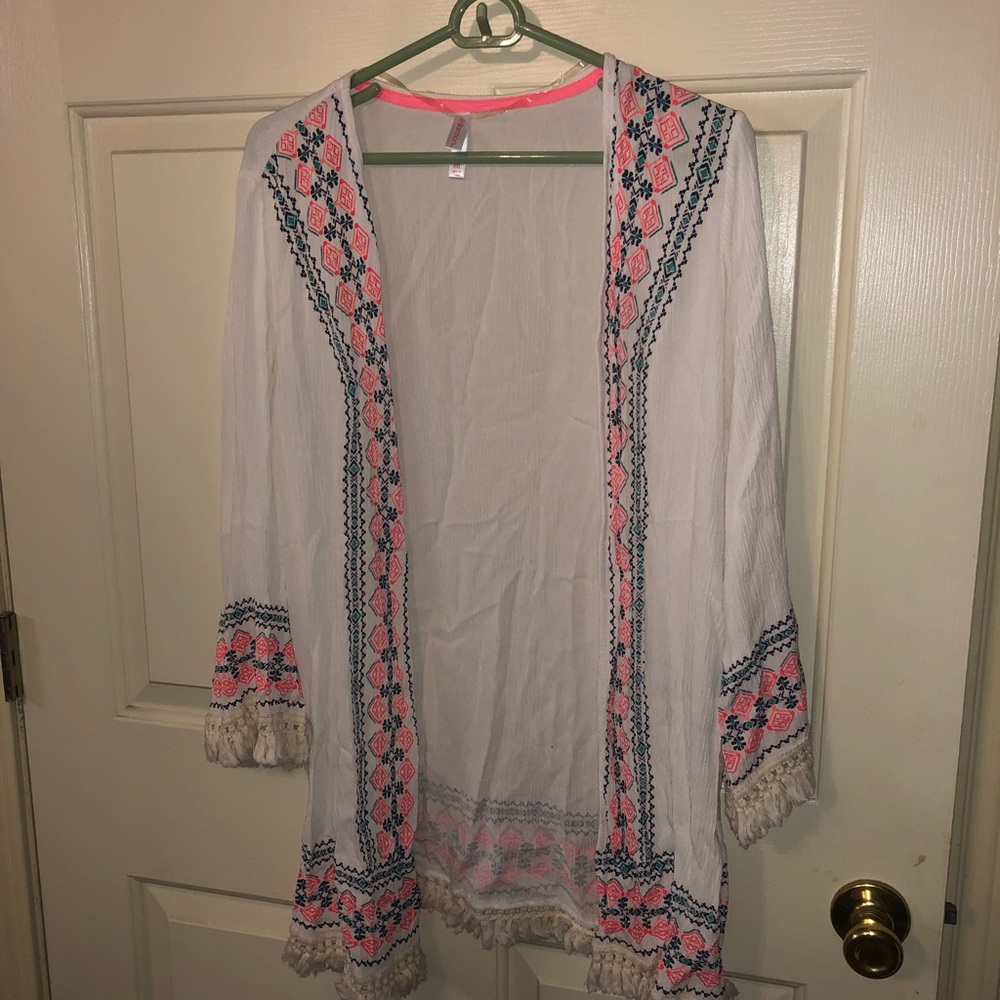 White kimono with teal and pink detail